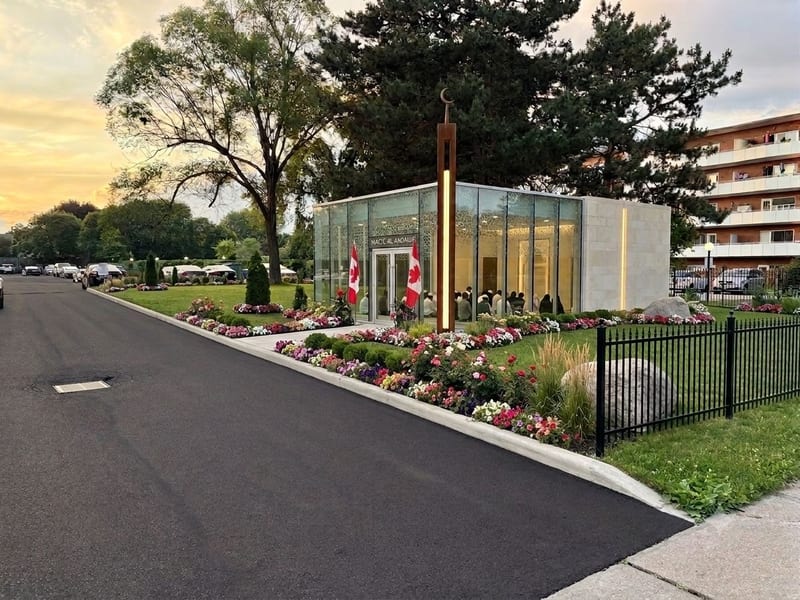 Architectural rendering of the masjid planned at Al Andalus Mississauga, seen from the street at dusk