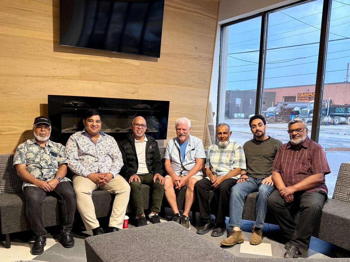 Board members of Tawakkul and Imdadul Islamic Centre seated together after a joint meeting